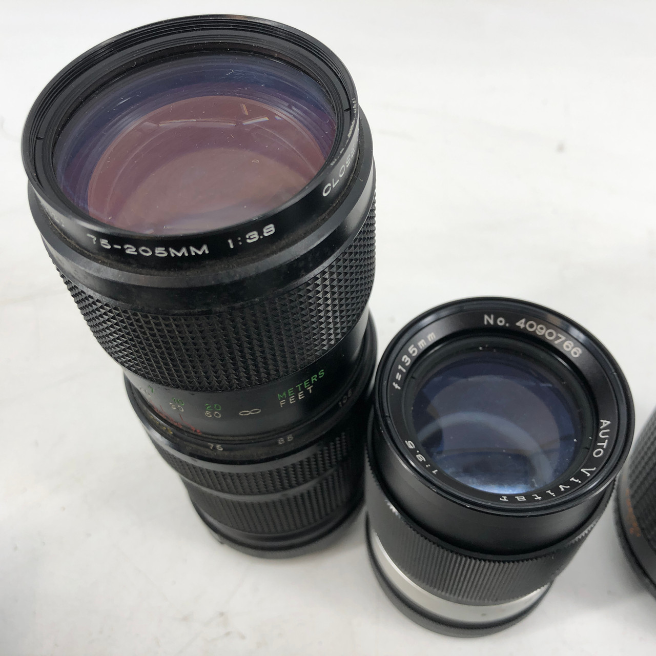 ASSORTED MF 11 LENSES FROM VIVATAR, MINOLTA, PENTAX AND MORE