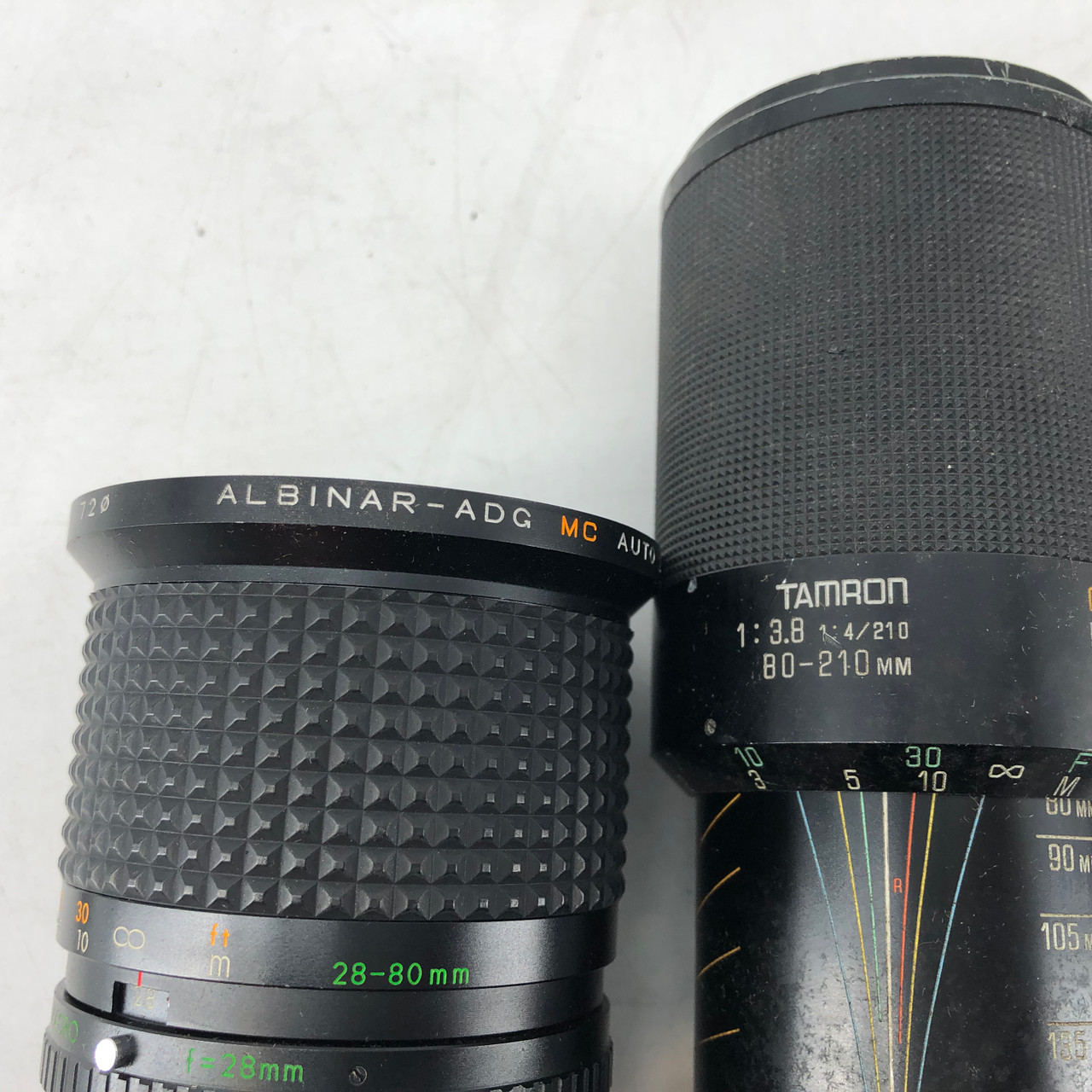 ASSORTED MF 11 LENSES FROM VIVATAR, MINOLTA, PENTAX AND MORE
