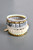 Gray, white, and brass wrap bracelet