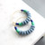 Lava bead and vulcanite hoop earrings
