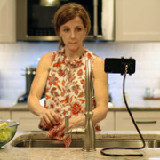 Flexible iPhone stand being used in kitchen PED5-COIL Flexible iPhone stand being used in kitchen PED5-COIL