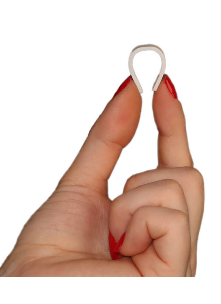 Fujitsu UHF RFID linen clip tag held between fingers