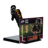 NFL Jayden Daniels Alternate Black Uniform McFarlane Legacy Series 7-Inch Action Figure, featuring a detailed football player figure in a black uniform with yellow and red accents, helmet, and a display stand with team branding and a background image of J