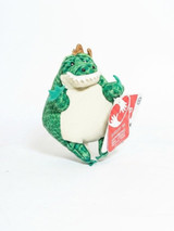 Wild Republic Crocodile Wild Republic Flipkins 5-Inch Fun Weighted Soft Plush, a cute green crocodile plush toy with a friendly face and white belly, holding a star-shaped item.
