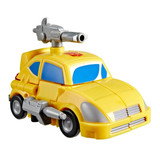 Transformers Devastation Bumblebee Transformers Studio Series, yellow toy car with blue windows and missile accessories on the sides and a missile turret on the roof.