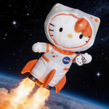 Hello Kitty NASA Helloy Kitty Astronaut Sanrio 8 Inch Plush, plush toy dressed as an astronaut with rocket launch background.
