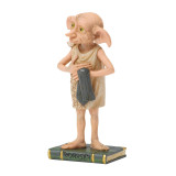 Enesco Dobby Personality Pose Jim Shore Harry Potter 4.5-Inch Figurine, crafted collectible figurine depicting Dobby the house elf with detailed features and pose, standing on a Harry Potter-themed base.