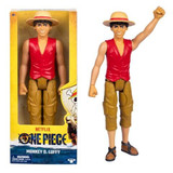 One Piece Monkey D. Luffy 12-Inch Large Action Figure, front view in packaging and with arm raised, featuring iconic straw hat, red vest, and brown pants.
