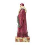 Enesco Albus Dumbledore Jim Shore 8 Inch Figurine Harry Potter Collection 6018662, detailed ceramic figurine of Albus Dumbledore with long white beard, glasses, and pinkish robe, standing on a colorful brick base, part of the Harry Potter collection by Jim Shore.