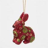 Department 56 Forest Rabbit Department 56 3 Inch Ornament 6019515, a festive red rabbit ornament decorated with green and gold floral patterns.
