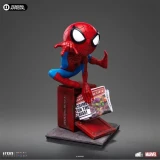 Marvel Spider-Man Iron Studios Mini Co. Marvel Comics 6-Inch PVC Figure, a detailed Spider-Man toy figurine in a crouching pose on a red base with a comic book stand featuring Spider-Man comic cover and a newspaper.