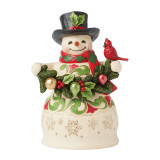 Enesco Snowman Garland & Cardinal Jim Shore 9 Inch Figurine Heartwood Creek 6017054, festive holiday snowman figurine with holly and berry decorations, a cardinal bird perched on its arm, wearing a black top hat with holly, and a red and green scarf.