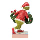 Enesco Grinch with Multiple Wreaths Jim Shore 8 Inch Figurine Grinch Collection 6018963, a colorful figure of the Grinch dressed in a red Santa coat and hat, holding green wreaths decorated with red berries and bows.