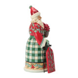 Enesco Santa with Sled Highland Glen Jim Shore 8 Inch Figurine Heartwood Creek 6019271, detailed colorful Christmas Santa figurine holding a sled and a bouquet of poinsettias.