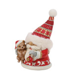 Enesco Gnome Hugging Cute Puppy Jim Shore 6 Inch Figurine Heartwood Creek, a decorative holiday figurine of a gnome with a fluffy red hat and a puppy, designed with intricate details and vibrant colors.
