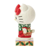 Hello Kitty with Scarf Jim Shore Sanrio 6.5-Inch Figurine, festive holiday themed Hello Kitty figurine wearing a green and red outfit with a red scarf, standing on a decorated base with holly leaves.