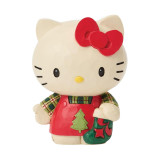 Hello Kitty Christmas Mini Jim Shore Sanrio 3-Inch Figurine, festive holiday-themed Hello Kitty figurine wearing a red dress with a Christmas tree design, holding a green stocking with red accents, and featuring a red bow on her head
