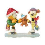 Enesco Garfield, Odie & Pooky Skating Jim Shore 6 Inch Figurine from the Garfield Collection, featuring characters in winter holiday attire ice skating and holding Pooky the teddy bear, detailed and colorful.