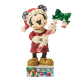 Disney Mickey with Candy Cane Jim Shore 5.5 Inch Figurine, a detailed collectible figurine featuring Mickey Mouse dressed in Christmas attire holding a candy cane with a green bow, made by Disney Traditions.