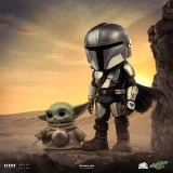 Marvel The Mandalorian and Grogu Minico Iron Studios Star Wars Vinyl Figure, collectible figures of The Mandalorian in armor with Grogu, standing on a rocky landscape at sunset.