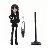 Monster High Wednesday Addams Monster High Wednesday Series Doll, doll dressed in black with braided hair, standing next to a small hanging doll, and a black stand on a white background.