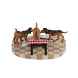 Department 56 Turkey for the Hounds, A Christmas Story Village 2.4-Inch Figurine, featuring three dogs around a table with a red checkered tablecloth.