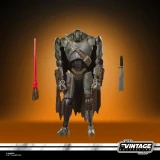 Star Wars Mercenary Droid Star Wars Vintage Collection 3.75-Inch Action Figure VC407, detailed military-style robot with accessories including a red staff, a gray knife, and a tactical pouch, posed against an orange background.