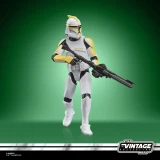 Star Wars Clone Trooper Commander Star Wars Vintage Collection 3.75-Inch Action Figure VC404, detailed collectible figure in white, yellow, and black armor holding a blaster rifle against a green background.