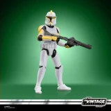 Star Wars Clone Trooper Commander Star Wars Vintage Collection 3.75-Inch Action Figure VC404, detailed model of a clone trooper in white armor with yellow accents, holding a blaster rifle, on a green background.