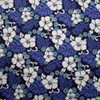 Turquoise, White, and Navy Hibiscus Island Floral Cotton Poplin Fabric By The Yard - Wide shot