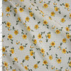 Yellow and Green Sunflowers on White Lightweight Ribbed Knit Fabric By The Yard
