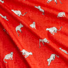 Boscage Wandering Leopards Ruby Cotton Poplin from Art Gallery Fabrics #29797 Fabric By The Yard