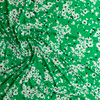 White and Black Floral on Bright Green NYC Designer Stretch Rayon Jersey Knit #30679 Fabric By The Yard - Wide shot