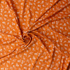 White on Pumpkin Floral Silhouettes Linen Look Rayon Woven #31817 Fabric By The Yard - Wide shot