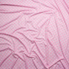 White on Pink Polka Dot Stretch Nylon/Lycra Fabric By The Yard - Wide shot