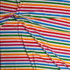 Rainbow Stripe on White Stretch Nylon/Lycra Knit Fabric By The Yard - Wide shot