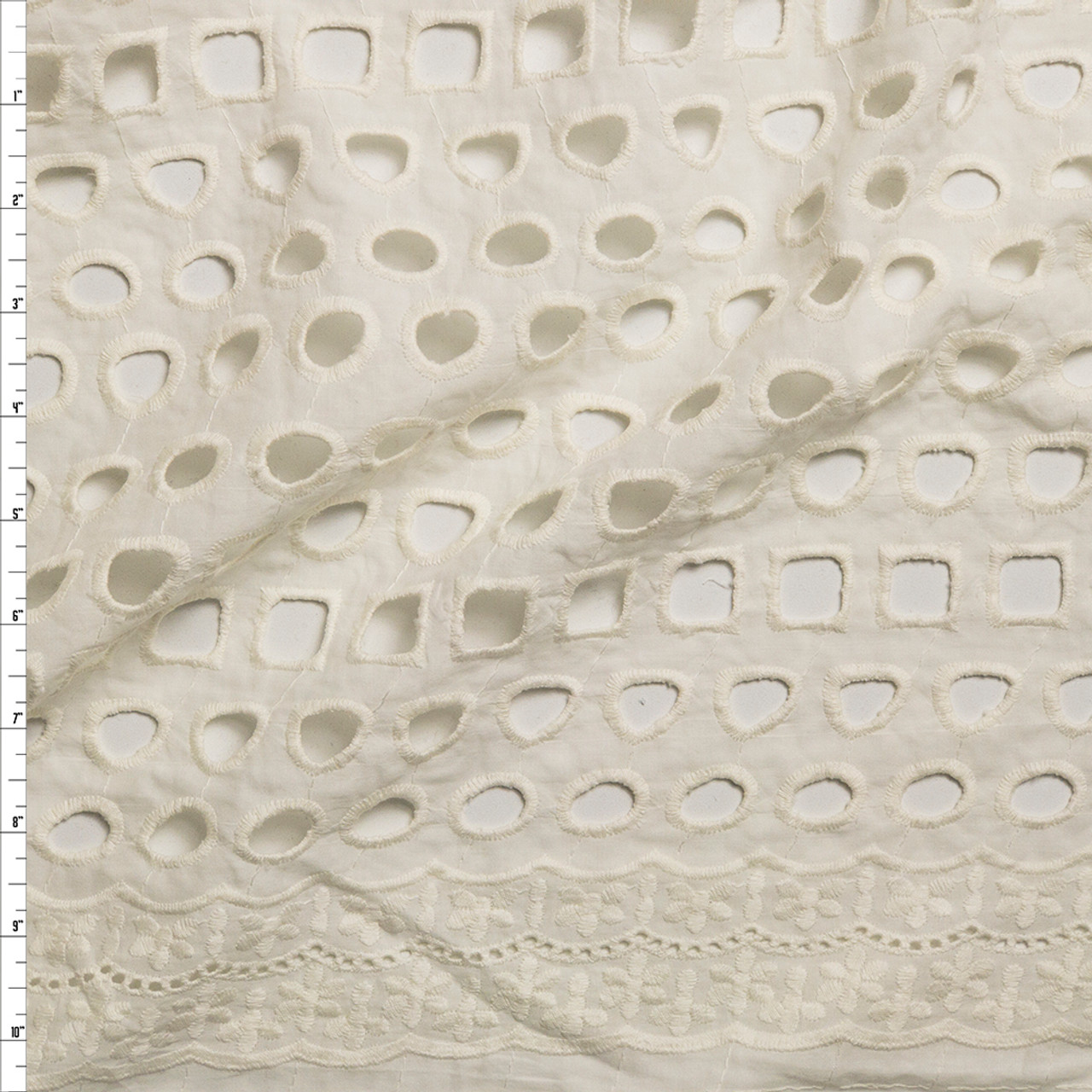 eyelet fabric with scalloped edge