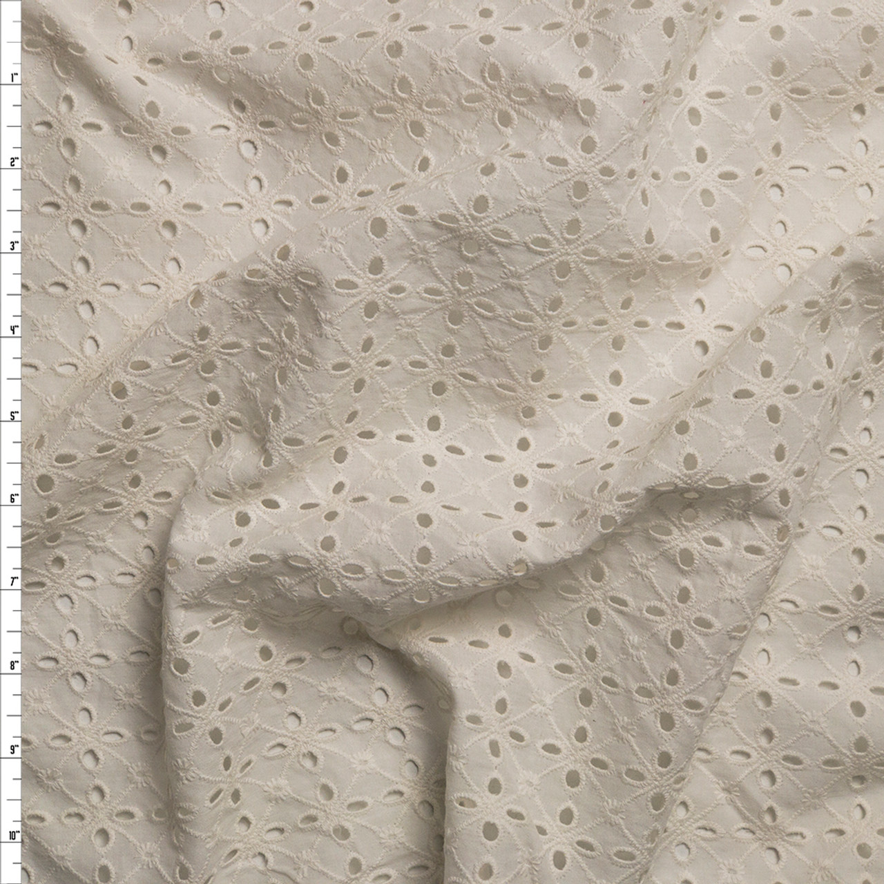 white cotton eyelet fabric