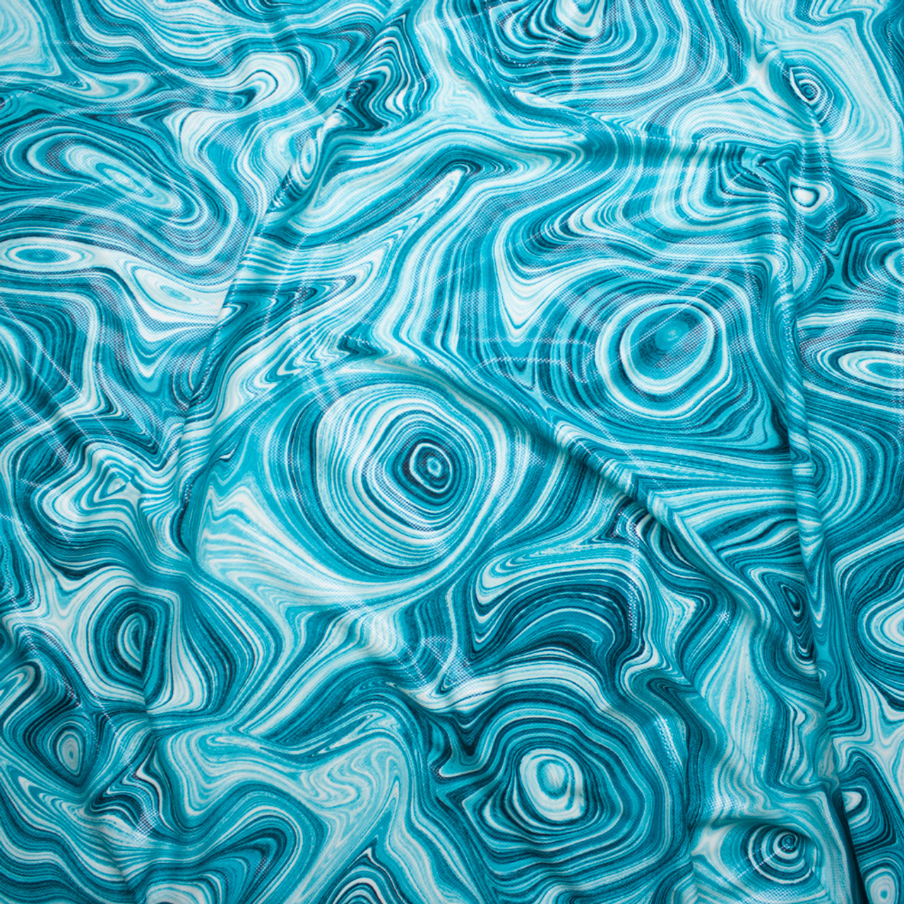 Cali Fabrics Turquoise Paint Swirl Dot Glossed Poly Knit Fabric By The Yard