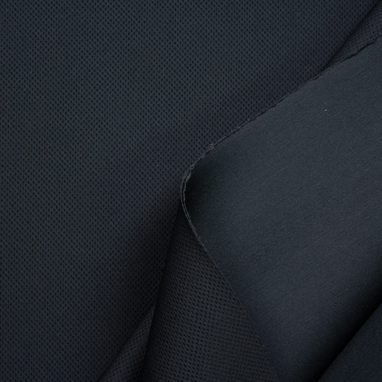Perforated Stretch – Discovery Fabrics