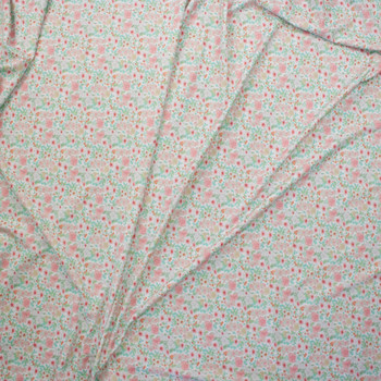 Pink, Green, and Aqua Small Floral on White Designer Nylon/Spandex Fabric By The Yard - Wide shot
