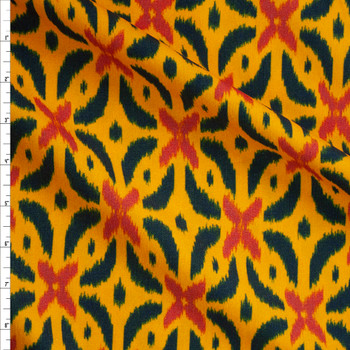 Red and Emerald Ikat on Bright Orange Baby Wale Corduroy Fabric By The Yard