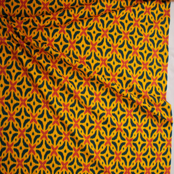 Red and Emerald Ikat on Bright Orange Baby Wale Corduroy Fabric By The Yard - Wide shot