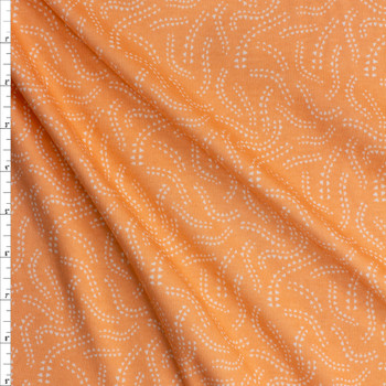 White Geo Squiggles on Apricot Organic Cotton Jersey Fabric By The Yard