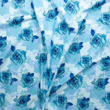 Blue And Turquoise Floral On Light Blue Stretch Cotton Poplin Fabric By The Yard - Wide shot