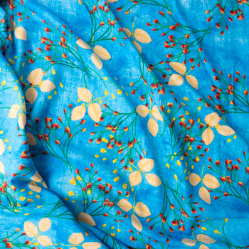 Red, Yellow, Green, And Tan Floral On Blue Cotton Lawn Fabric By The Yard - Wide shot