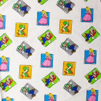 Mario and Friends Color Block Quilter’s Cotton from Maywood Studio #30468 Fabric By The Yard - Wide shot Mario and Friends Color Block Quilter’s Cotton from Maywood Studio #30468 Fabric By The Yard - Wide shot
