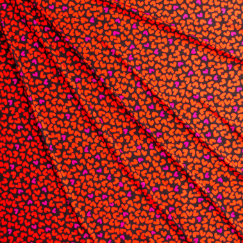 Red and Hot Pink Hearts on Black Stretch Modal Jersey Knit from ‘Hanky Panky’ #30668 Fabric By The Yard - Wide shot Red and Hot Pink Hearts on Black Stretch Modal Jersey Knit from ‘Hanky Panky’ #30668 Fabric By The Yard - Wide shot