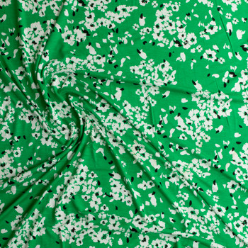 White and Black Floral on Bright Green NYC Designer Stretch Rayon Jersey Knit #30679 Fabric By The Yard - Wide shot White and Black Floral on Bright Green NYC Designer Stretch Rayon Jersey Knit #30679 Fabric By The Yard - Wide shot
