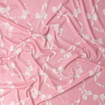 White Bows on Pink Stretch Poly Rib Knit #31898 Fabric By The Yard - Wide shot